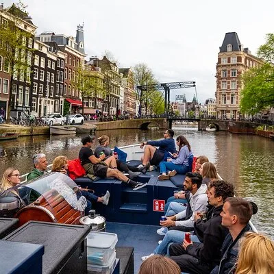 Amsterdam Canal Cruise With Live Guide and Unlimited Drinks
